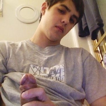 Cute Boy Holding His Erected Cock