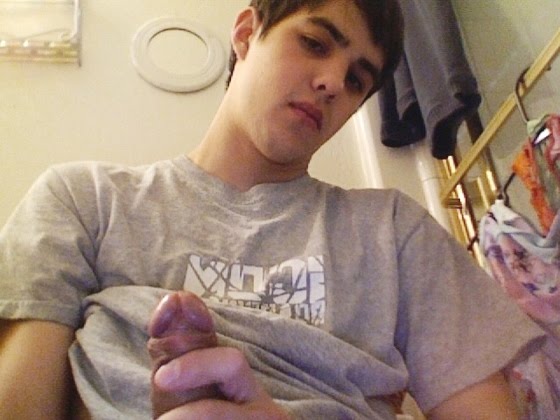 Cute Boy Holding His Erected Cock