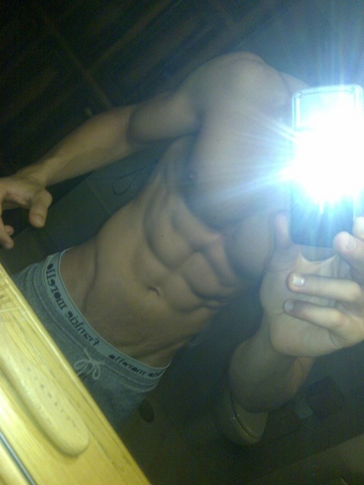 Muscle Boy Taking Self Pics In The Mirror